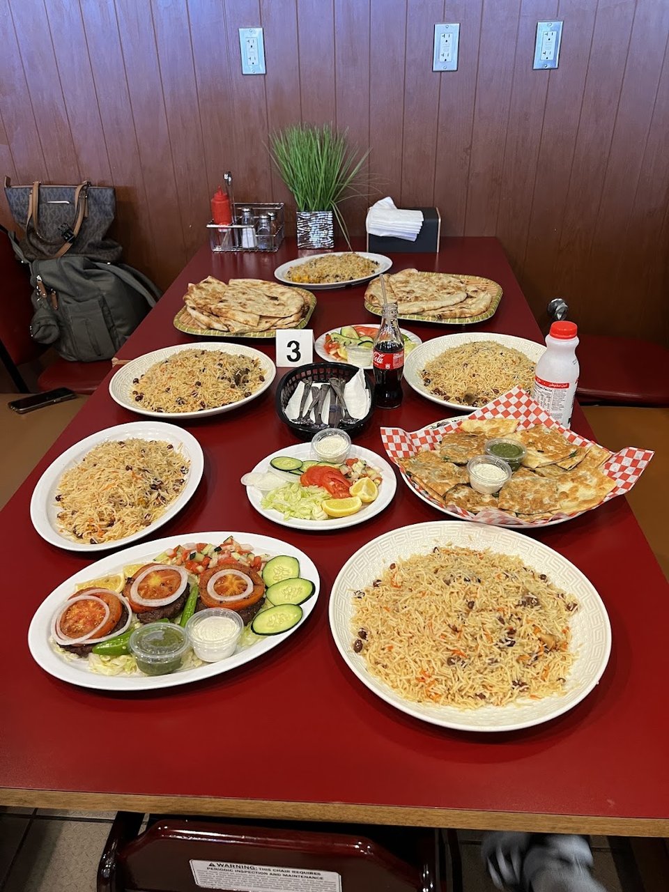 Featured items list with rice and grilled meats.