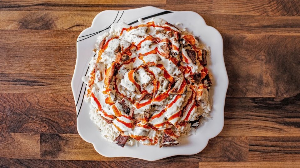 Restaurant menu showing comfort food and small plates.